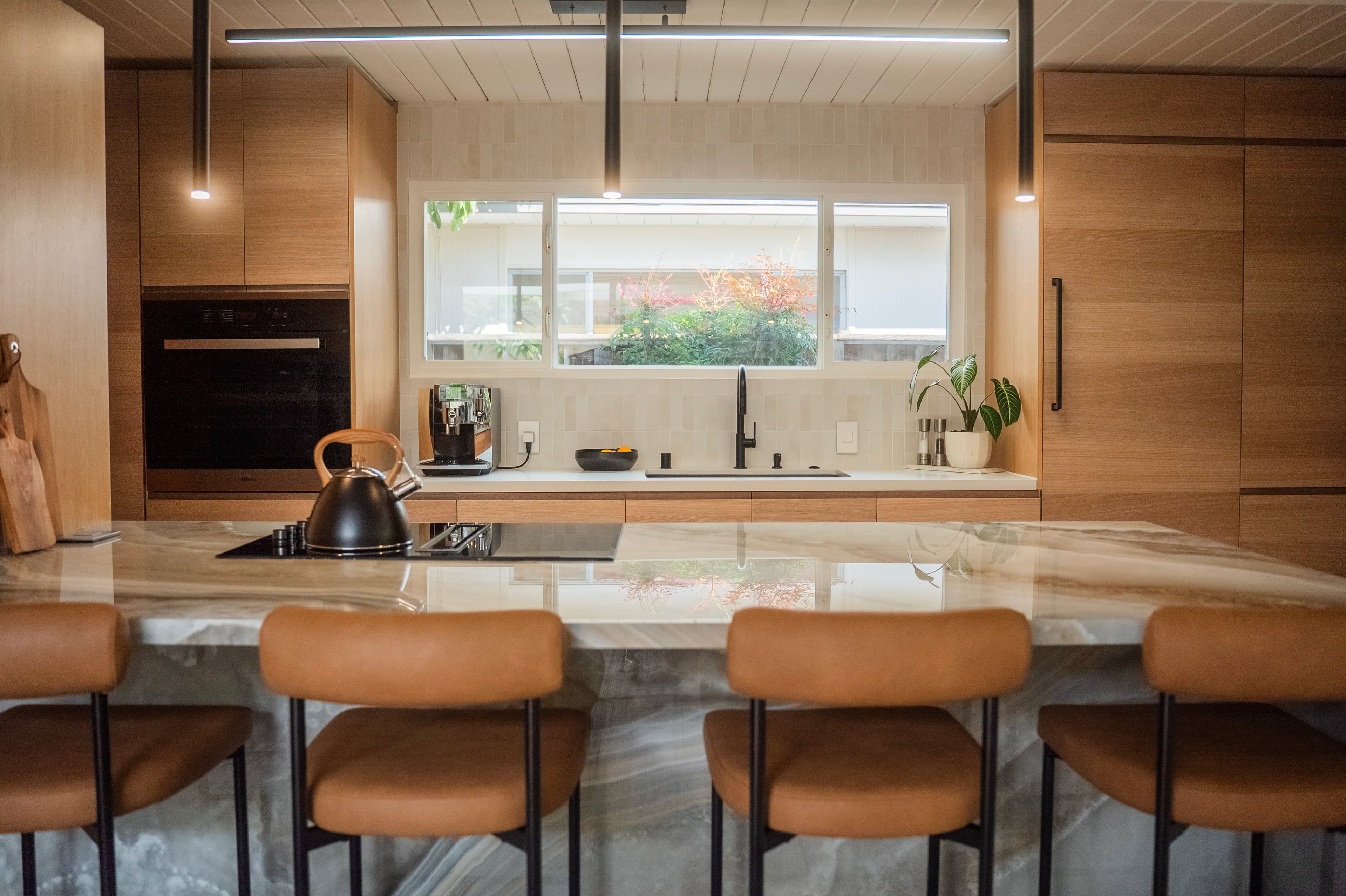 White oak cabinetry with integrated handles