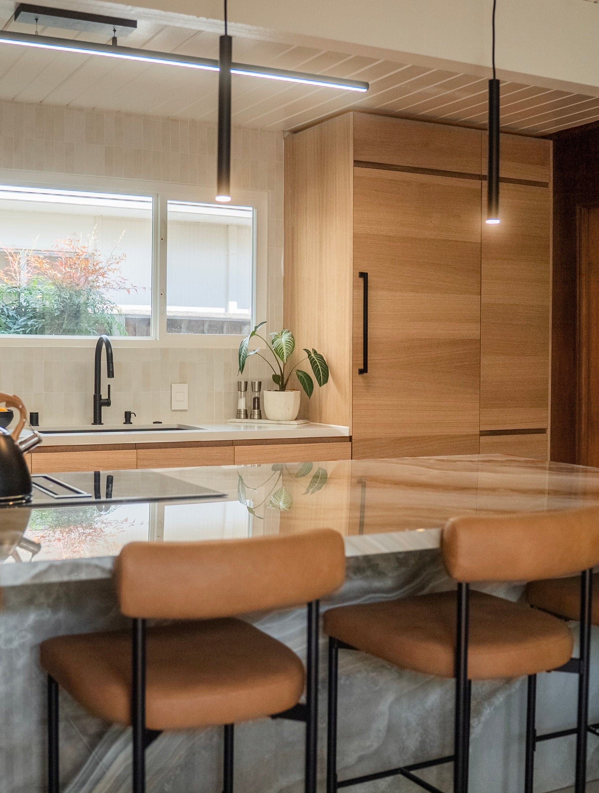 Close-up of white oak fronts and integrated handle profile