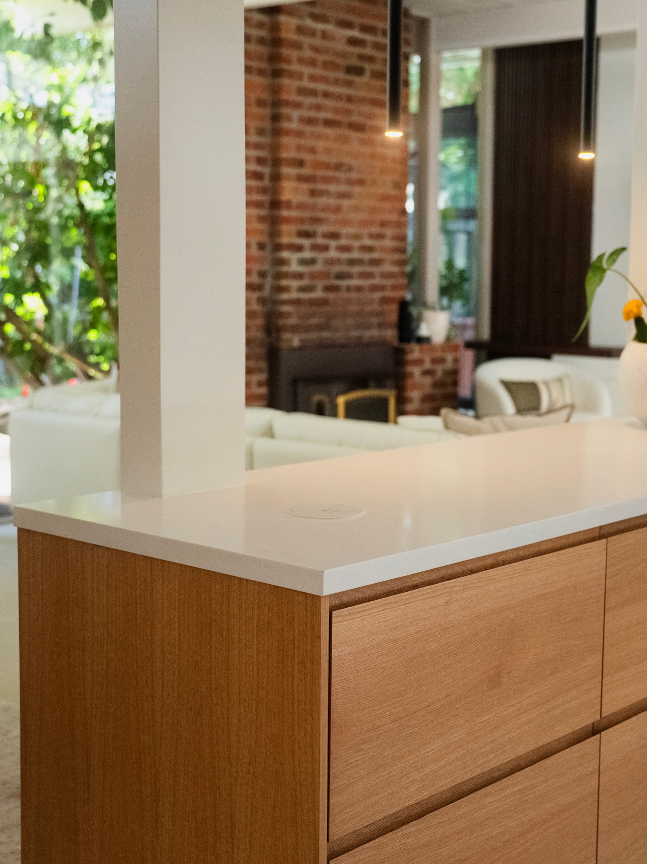 Finishing detail of the integrated white oak fronts