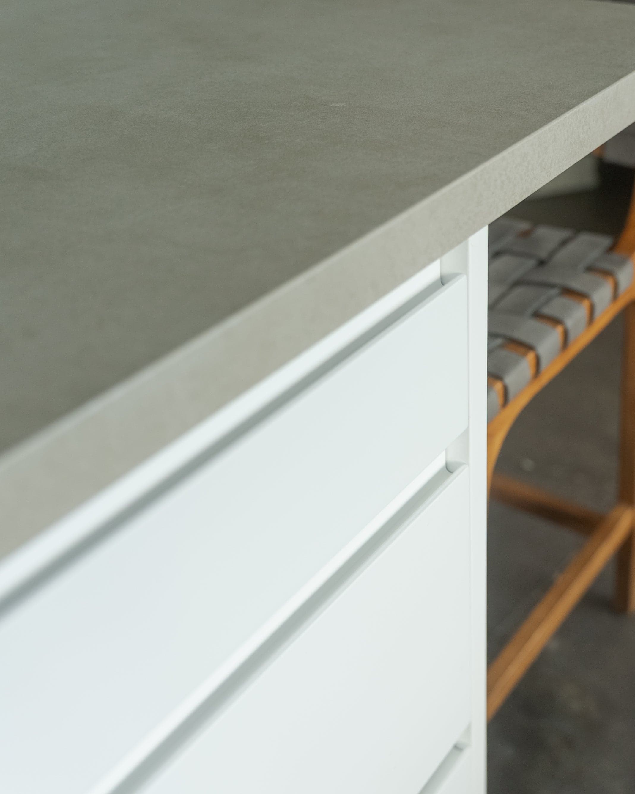 Matte white island with integrated handle detail