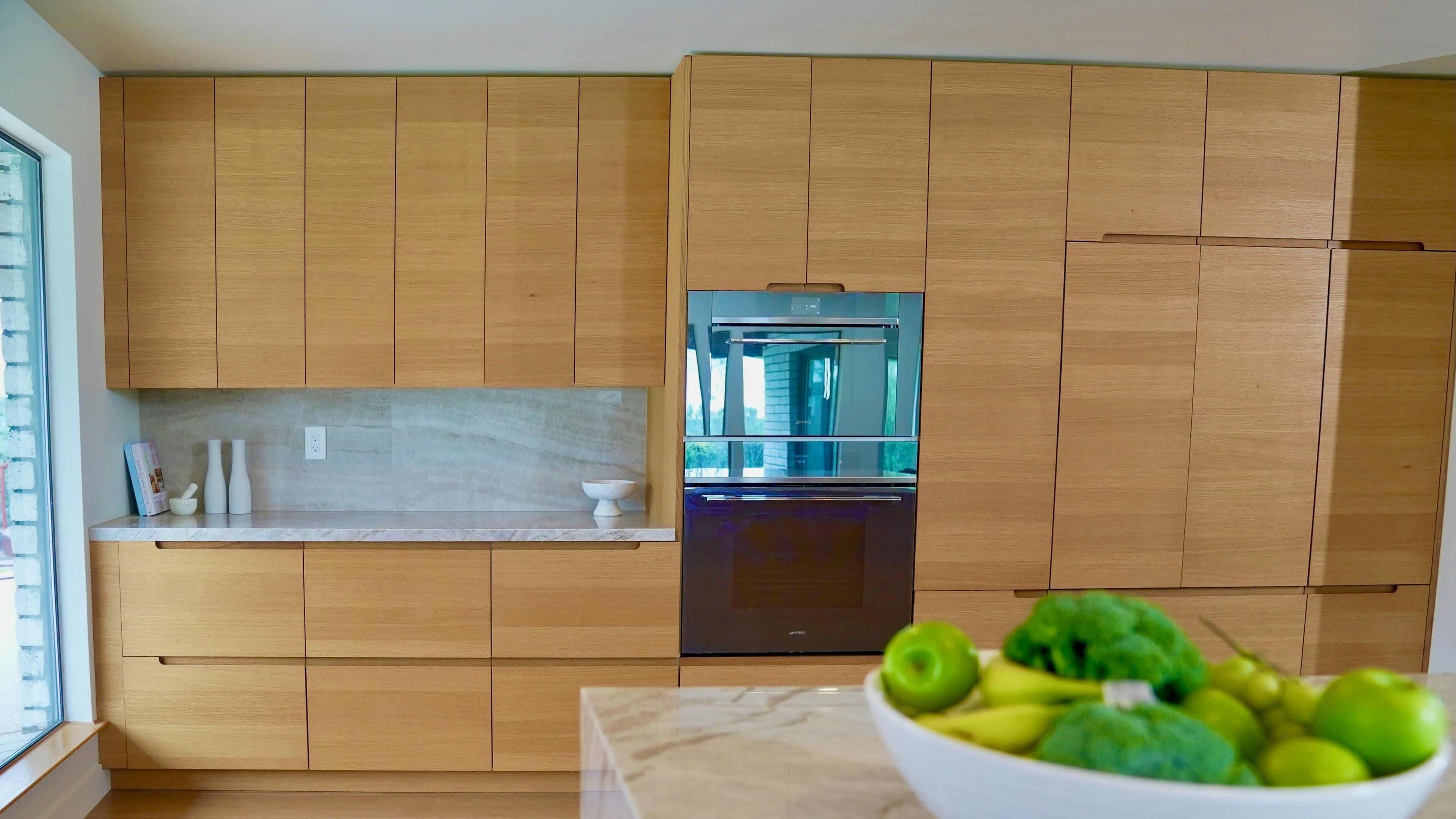 Full kitchen perspective with integrated appliances