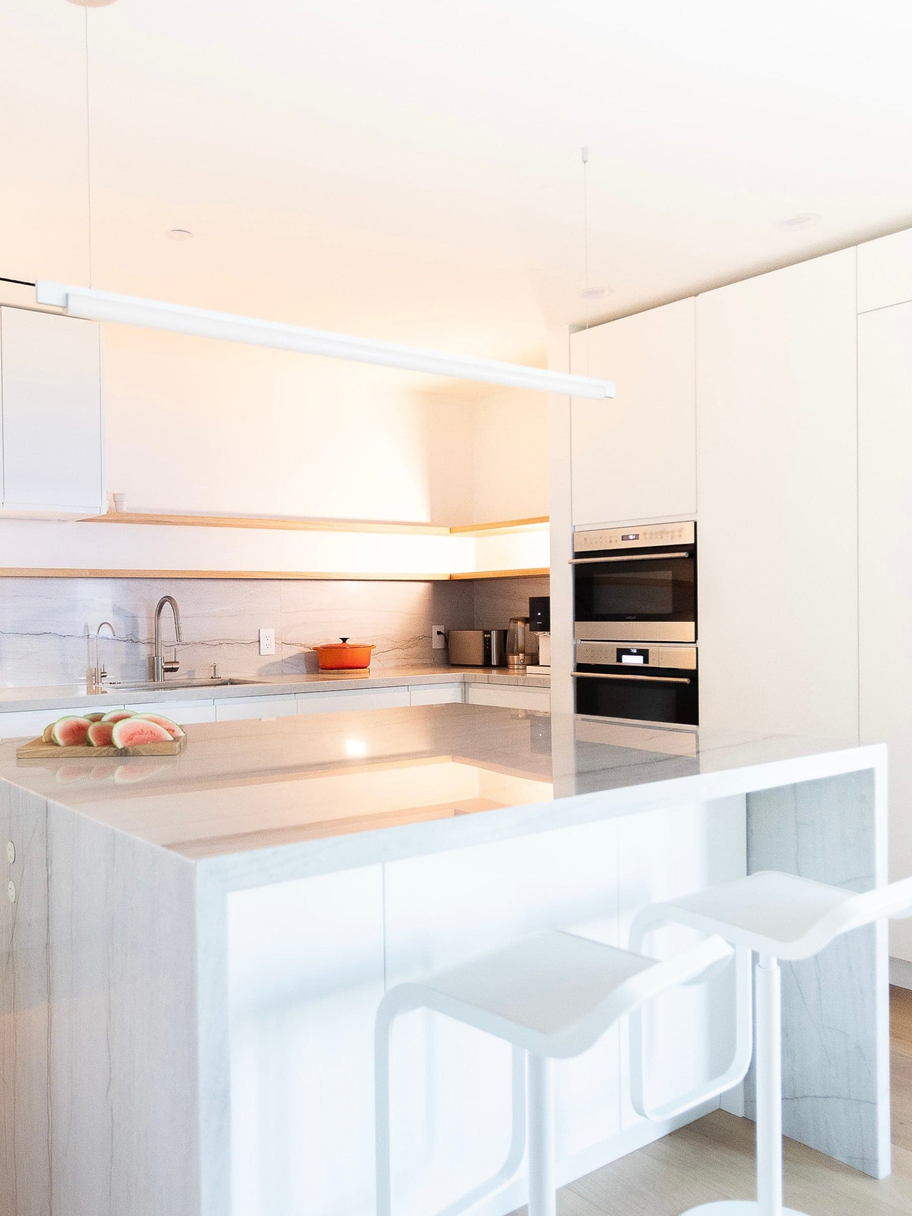 Kitchen workspace with seamless matte white fronts