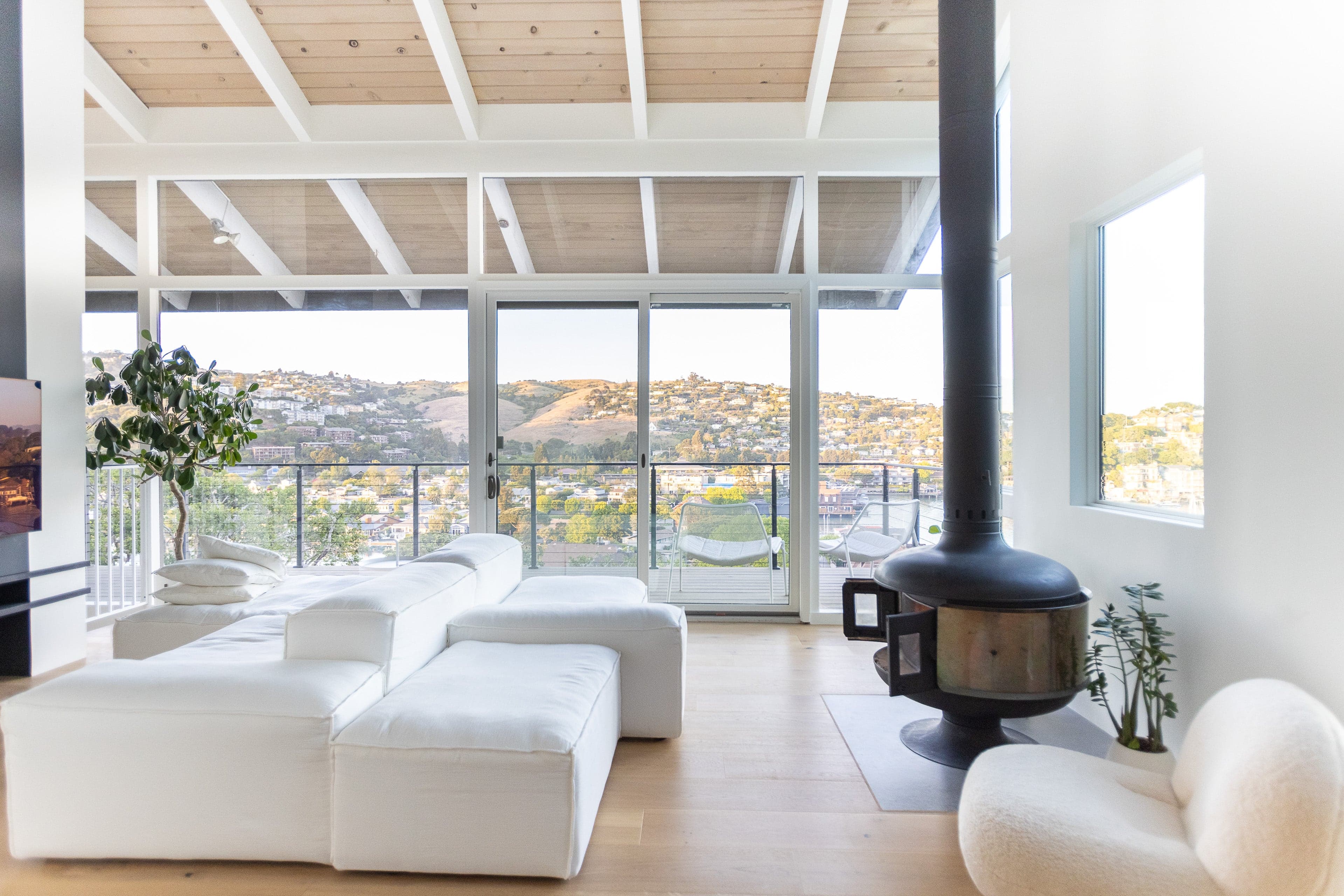 Living room and kitchen flow with fireplace